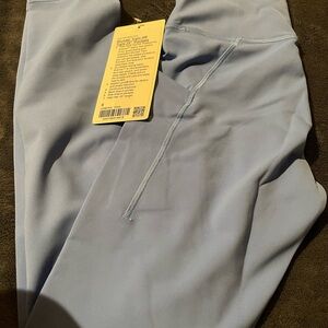 Lululemon wunder train HR tight 25” with pockets pool party size 6
